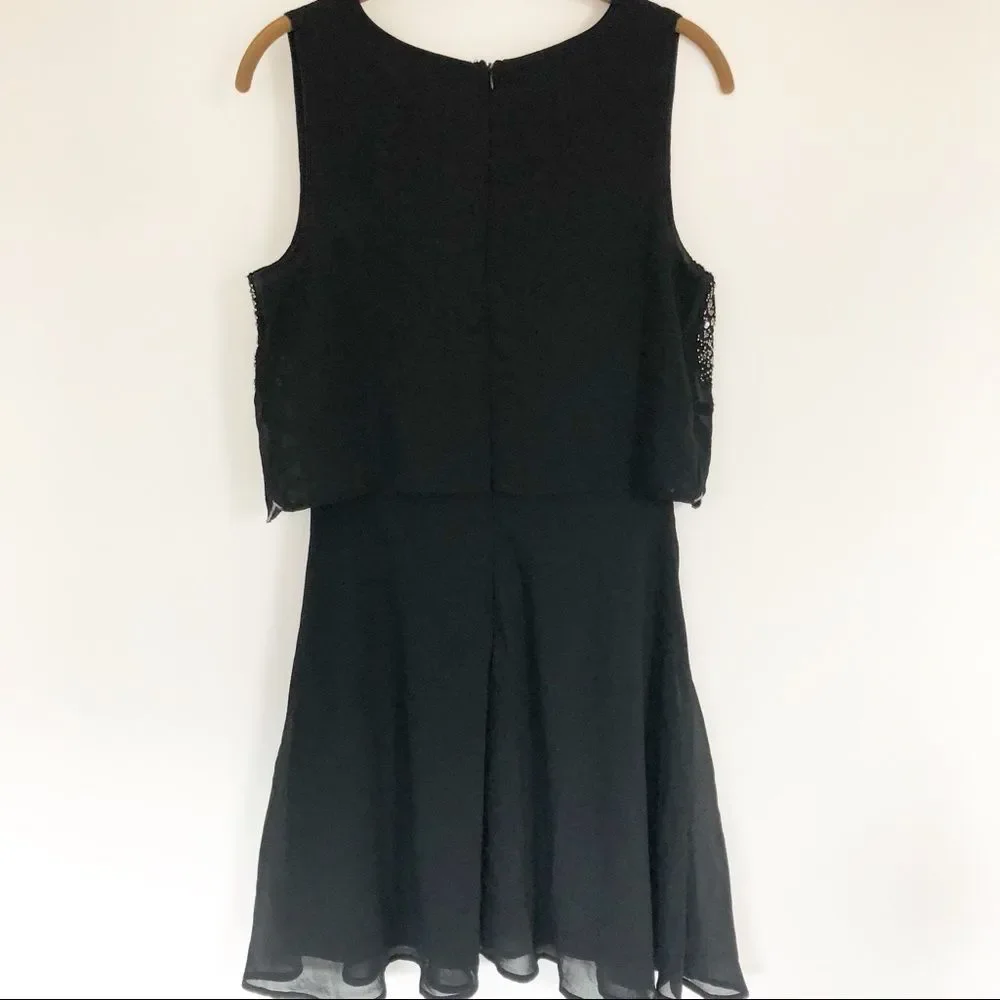 Francesca’s sequin pop-over dress Black Sz M